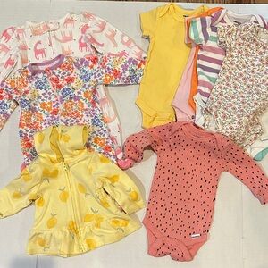 Mixed lot of baby girl bodysuits, sleepers, and a jacket